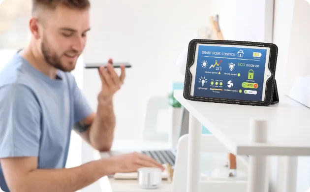 Tablet dashboard showing smart home energy management, security, and climate control settings.